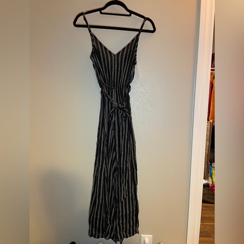 Francesca’s Jumpsuit w/ Black, White and Yellow Pattern